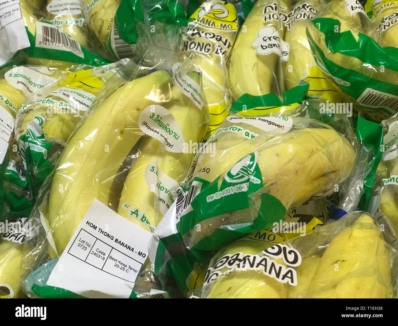 Bangkok, Thailand. 26th Mar, 2019. Bananas wrapped in plastic are ...