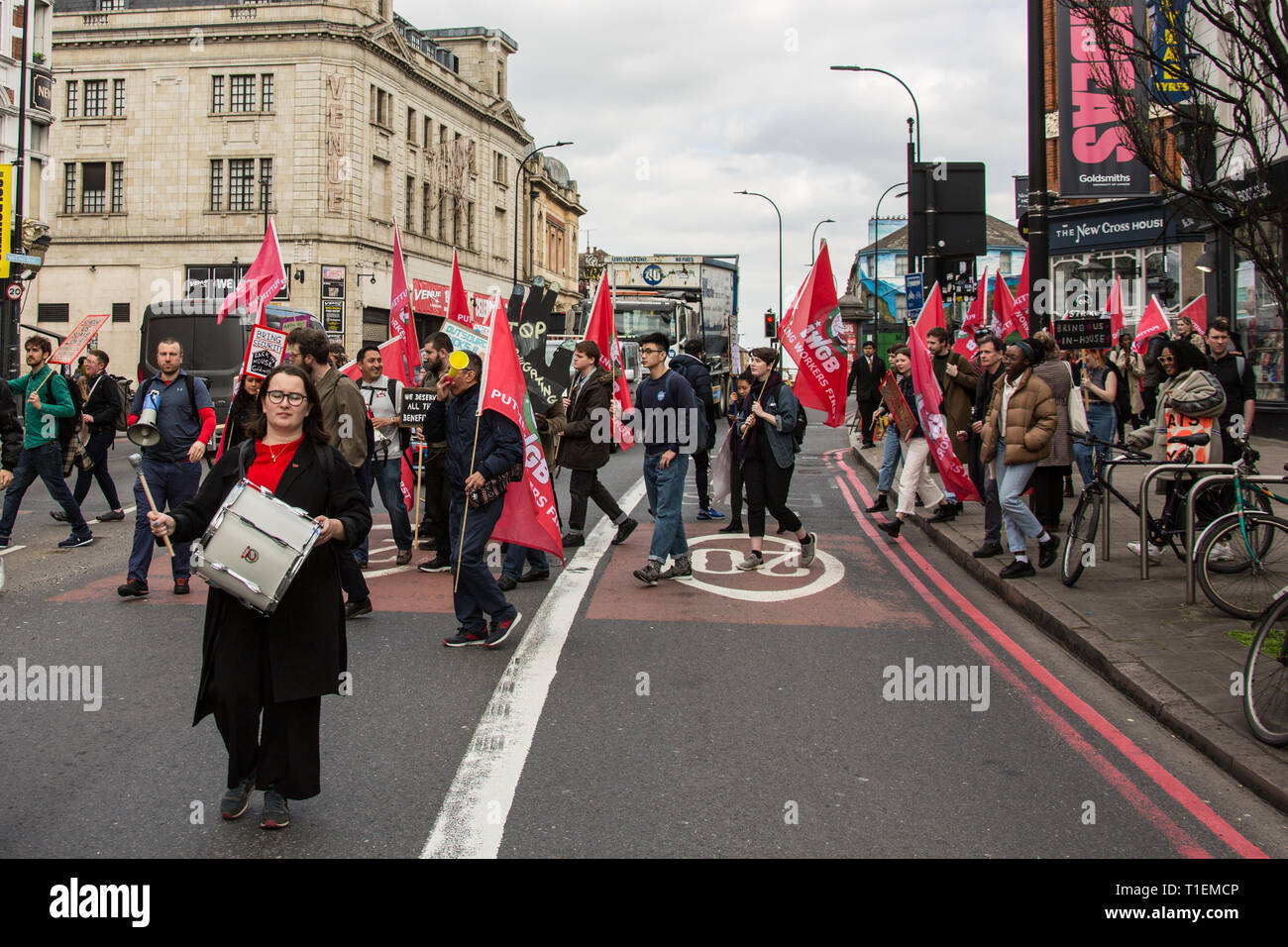 London, UK. 26 March, 2019. Security Officers and supporters at Goldsmiths College in South London marched through the campus where they addresses students in canteens and lecture theatres before taking to the streets to continue the campaign for jobs to be brought ‘in house' so that terms and conditions match those of staff directly employed by the college. David Rowe / Alamy Live News. Stock Photo