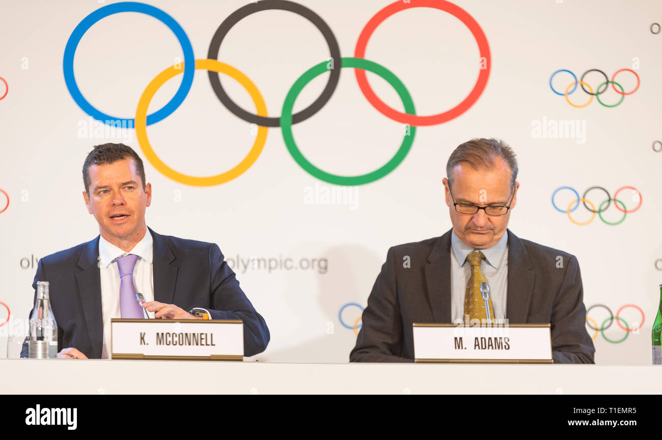 Lausanne, Switzerland. 26th March, 2019. Mark Adams (L), IOC Spokesperson, and Host K. McConnell (R) Hold Press Conference at Lausanne Palace after Executive board  in Lausanne, Switzerland, 26-03-2019. Credit: Eric Dubost/Alamy Live News Stock Photo