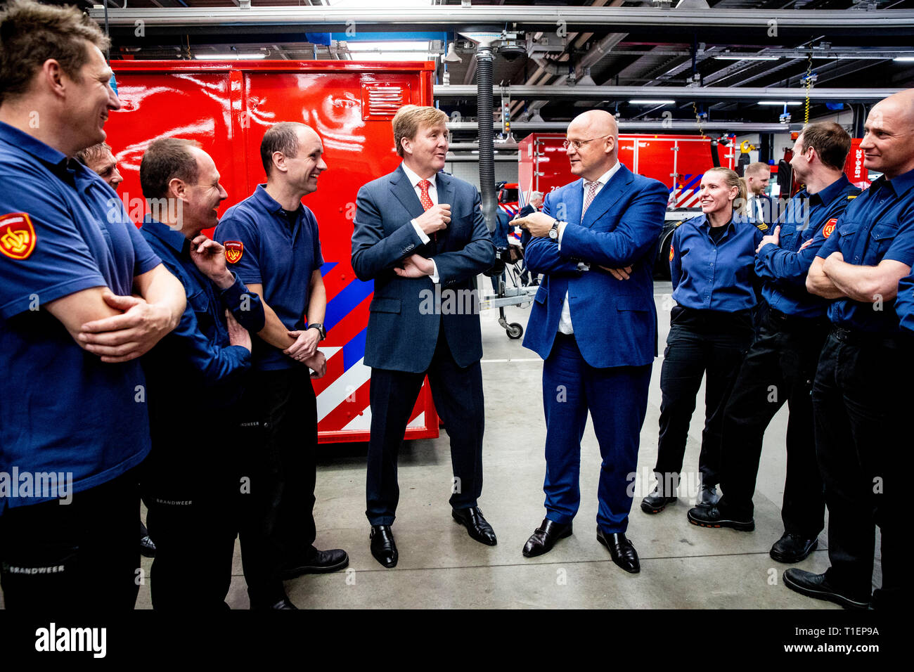 Tilburg, Netherlands. 26th Mar, 2019. King Willem-Alexander visit the safety region Midden-West Brabant with Justice minister Ferdinand Grapperhaus in Tilburg, The Netherlands, 26 March 2019. The King and Minister get an tour through a forestation. The visit is part of a series of visits with ministers. copyrught Credit: robin utrecht/Alamy Live News Stock Photo
