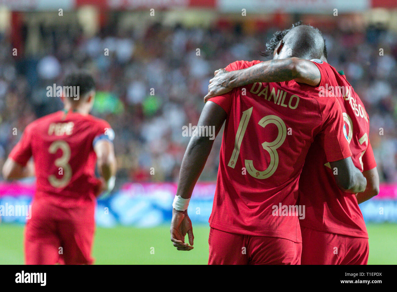 Lisbon, Portugal. 25th Mar, 2019. March 25, 2019. Lisbon, Portugal. Portugal's and Porto midfielder Danilo Pereira (13) celebrating with Portugal's and Braga forward Dyego Sousa (23) after scoring a goal during the European Championship 2020 Qualifying Round between Portugal and Serbia Credit: Alexandre de Sousa/Alamy Live News Stock Photo