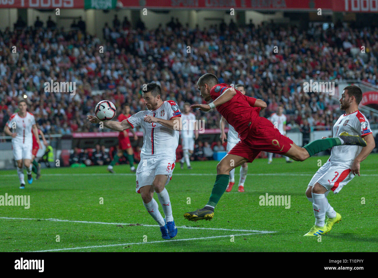 Lisbon, Portugal. 25th Mar, 2019. March 25, 2019. Lisbon, Portugal. Portugal's and Sevilla forward Andre Silva (9) and Serbia's and Astana defender Antonio Rukavina (2) during the European Championship 2020 Qualifying Round between Portugal and Serbia Credit: Alexandre de Sousa/Alamy Live News Stock Photo