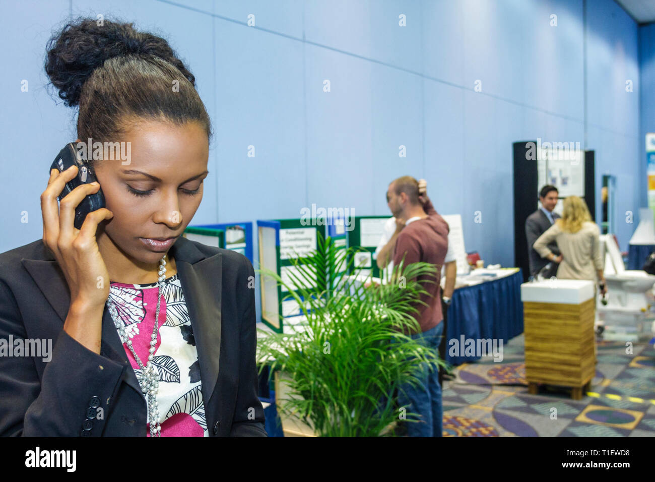 Miami Beach Florida,Miami Beach Convention Center,centre,Green Lodging Workshop,vendor vendors seller,stall stalls booth dealer merchants market marke Stock Photo