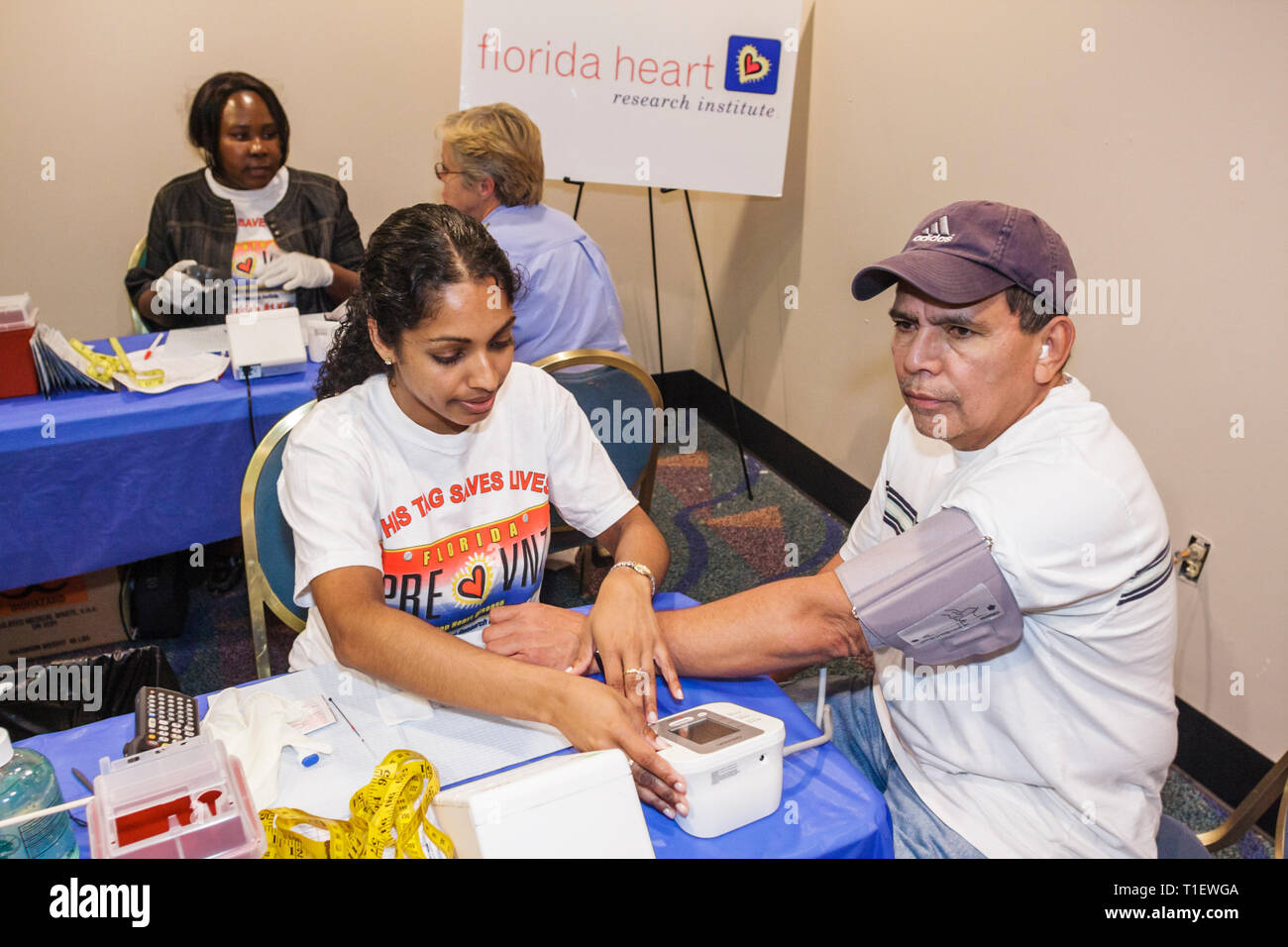 Miami Florida,James L. Knight Center,centre,woman's,woman's,men's Heart Health Fair,Sister to Sister Foundation,heart disease,health,prevention,Hispan Stock Photo