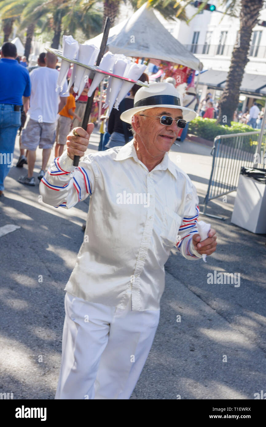 Miami Florida,Coral Gables,Coral Way,Miracle Mile,carnival,Carnaval on the Mile,street fair,festival,Hispanic man men male,vendor vendors stall stalls Stock Photo