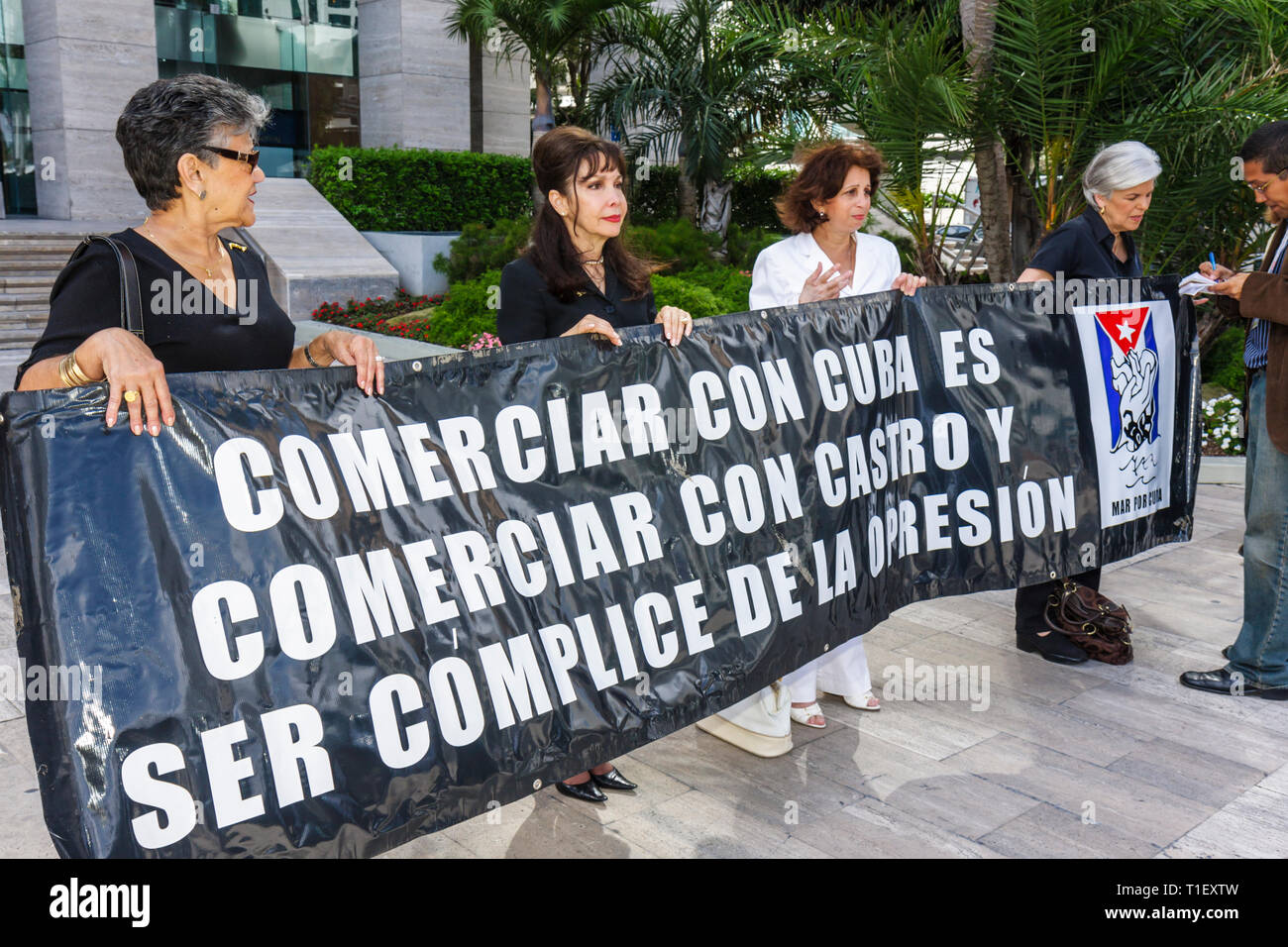 Miami Florida,Chopin Plaza,Intercontinental,hotel,Cuba Trade Expo Conference,trade embargo,protest,banner,exiles,Hispanic Cuban,woman female women,opp Stock Photo