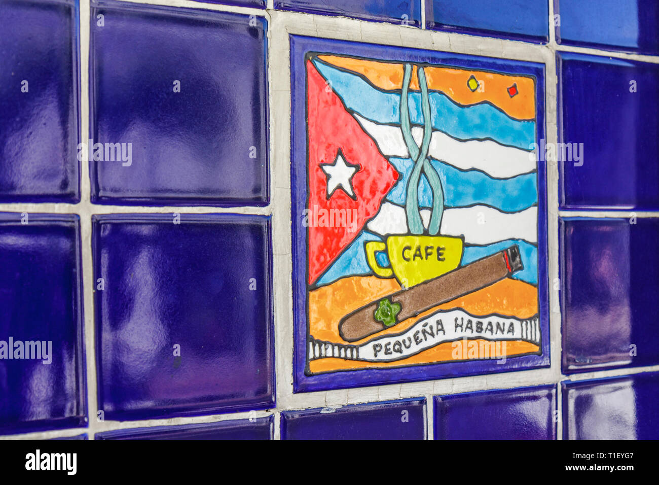 Miami Florida,Little Havana,Calle Ocho,Maximo Gomez Domino Park,tile,mosaic,colorful,blue,yellow,red,hand painted,Cuban flag,cigar,coffee cup,little H Stock Photo