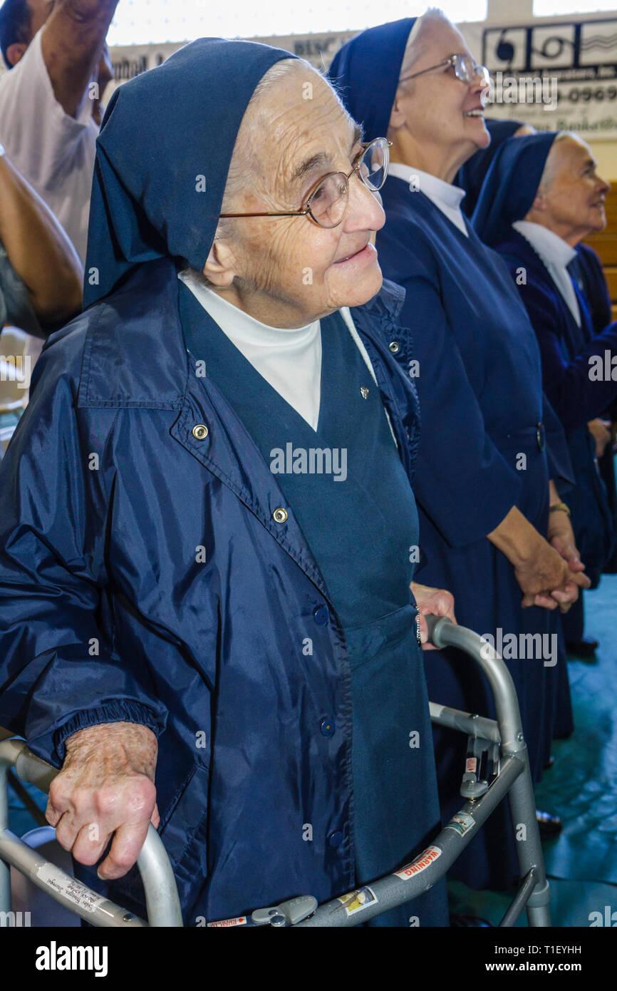 Miami Florida,Coconut Grove,LaSalle Catholic High School,street naming ceremony,Most Reverend Augustin Roman Way,Hispanic woman female women,nun,walke Stock Photo