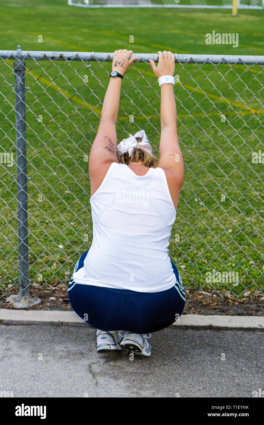 Squatting lady hi-res stock photography and images - Alamy