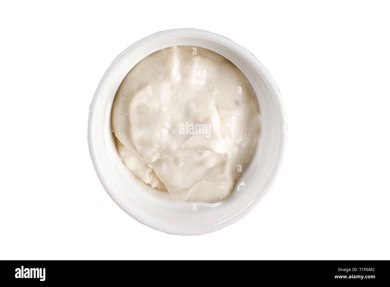 yogurt cream sauce in a bowl isolated on white background. One of the