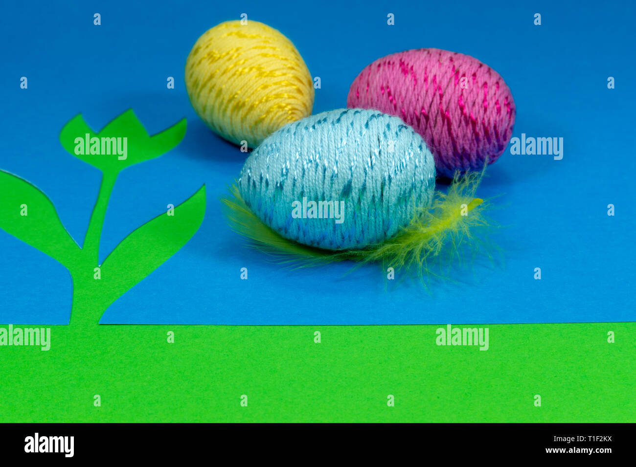 Easter Egg And Feather In Close Up As A Set Of Decoration On