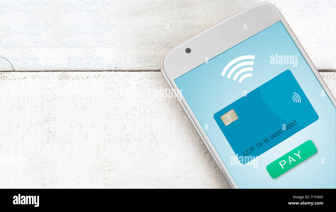 Credit card next to a smartphone mobile with NFC connection system for