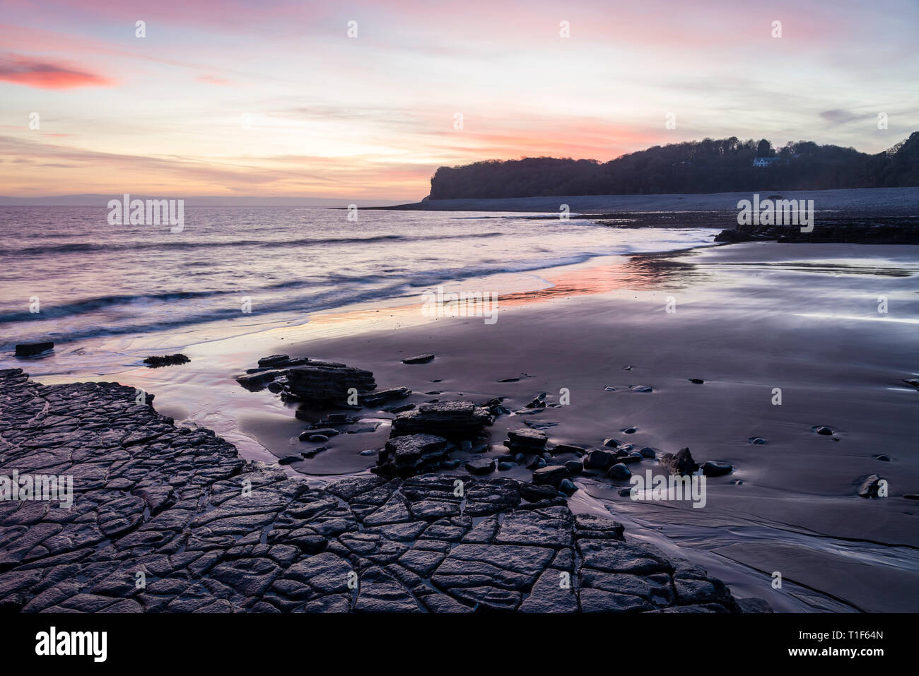 A tranquil coastal and seascape scenic view at sunset at Barry, South Wales Stock Photo