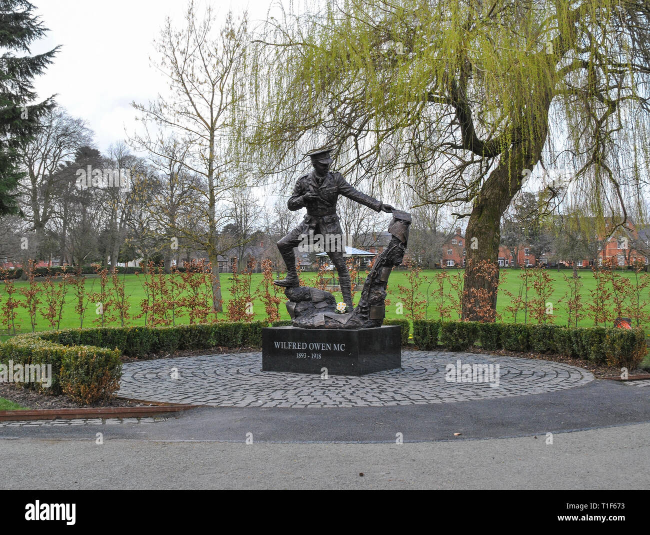 A statue of Wilfred Owen in Oswestry's Cae Glas town park Stock Photo