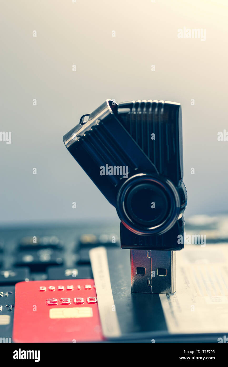 Online secure banking concept with usb and banking cards on laptop keyboard and copy space Stock Photo
