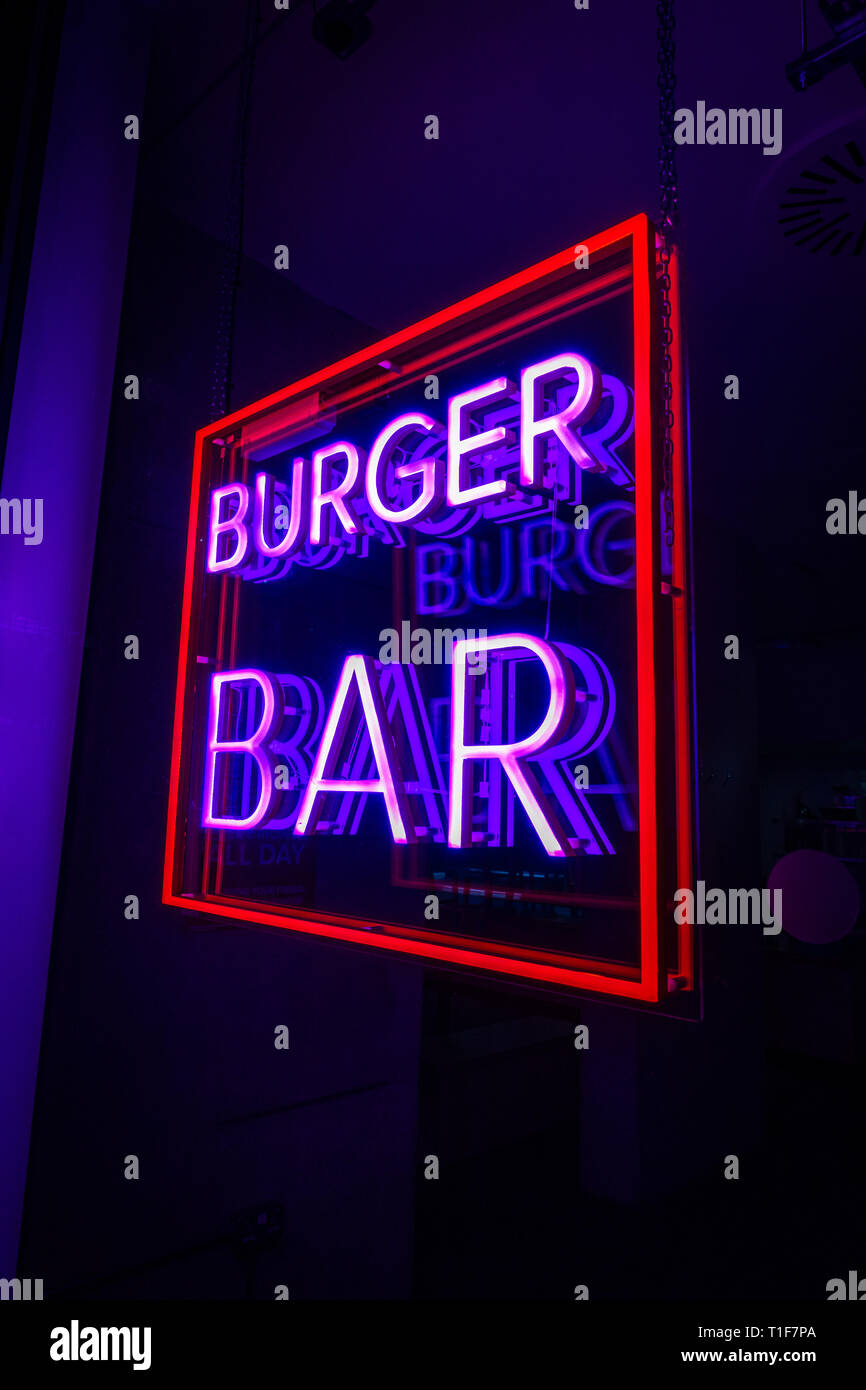 Burger Bar square Neon Sign lit up in a restaurant near Granary Square