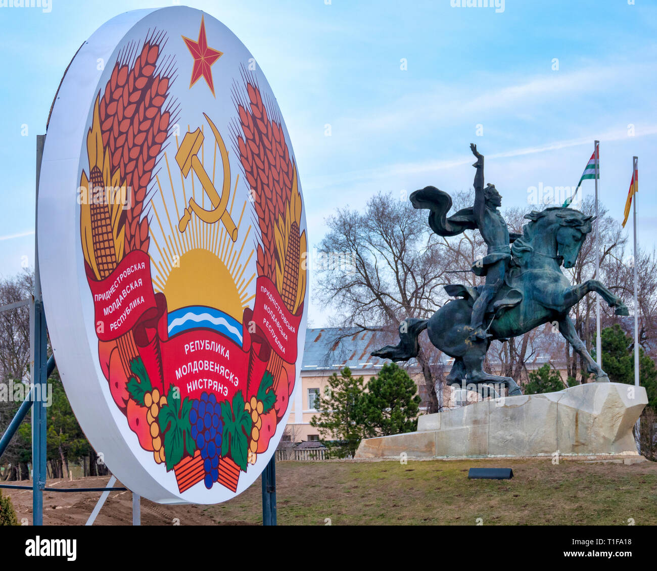 Transnistrian emblem and Monument to Suvorov in Suvorov Square in Tiraspol, Transnistria, Moldova Stock Photo