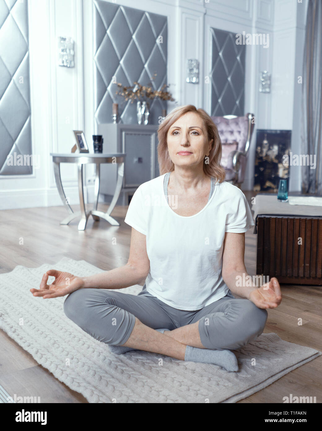 Beautiful fit mature woman sitting hi-res stock photography and images ...