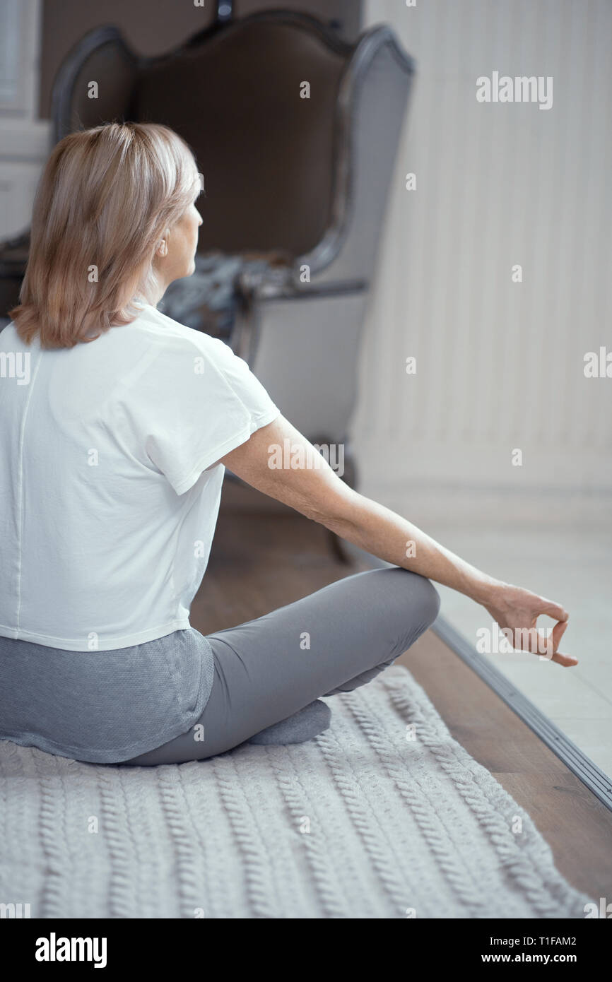 Beautiful fit mature woman sitting hi-res stock photography and images ...