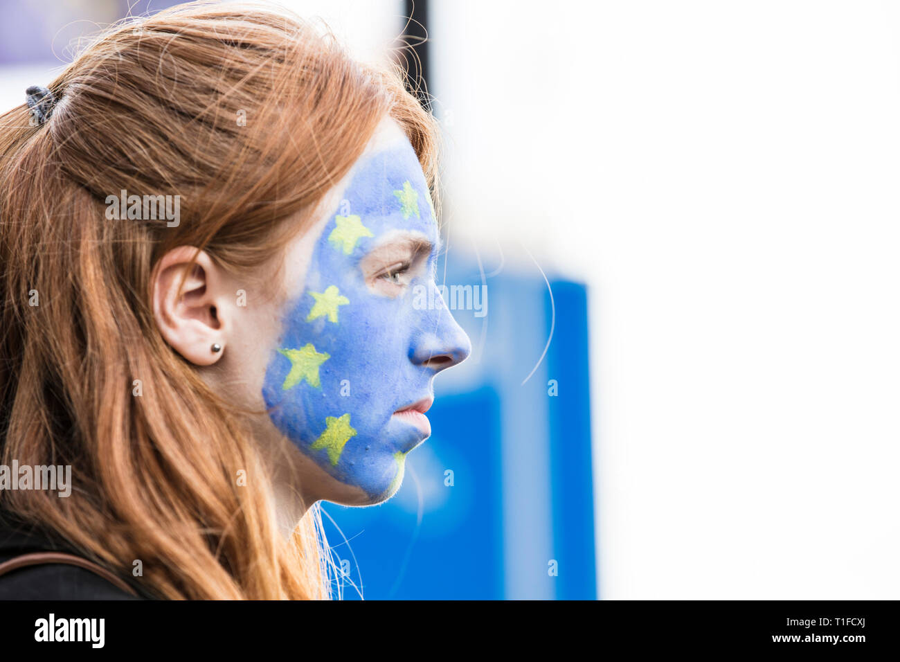 LONDON, UK - March 23rd 2019: People with European Union flag face paint at an anti Brexit march Stock Photo