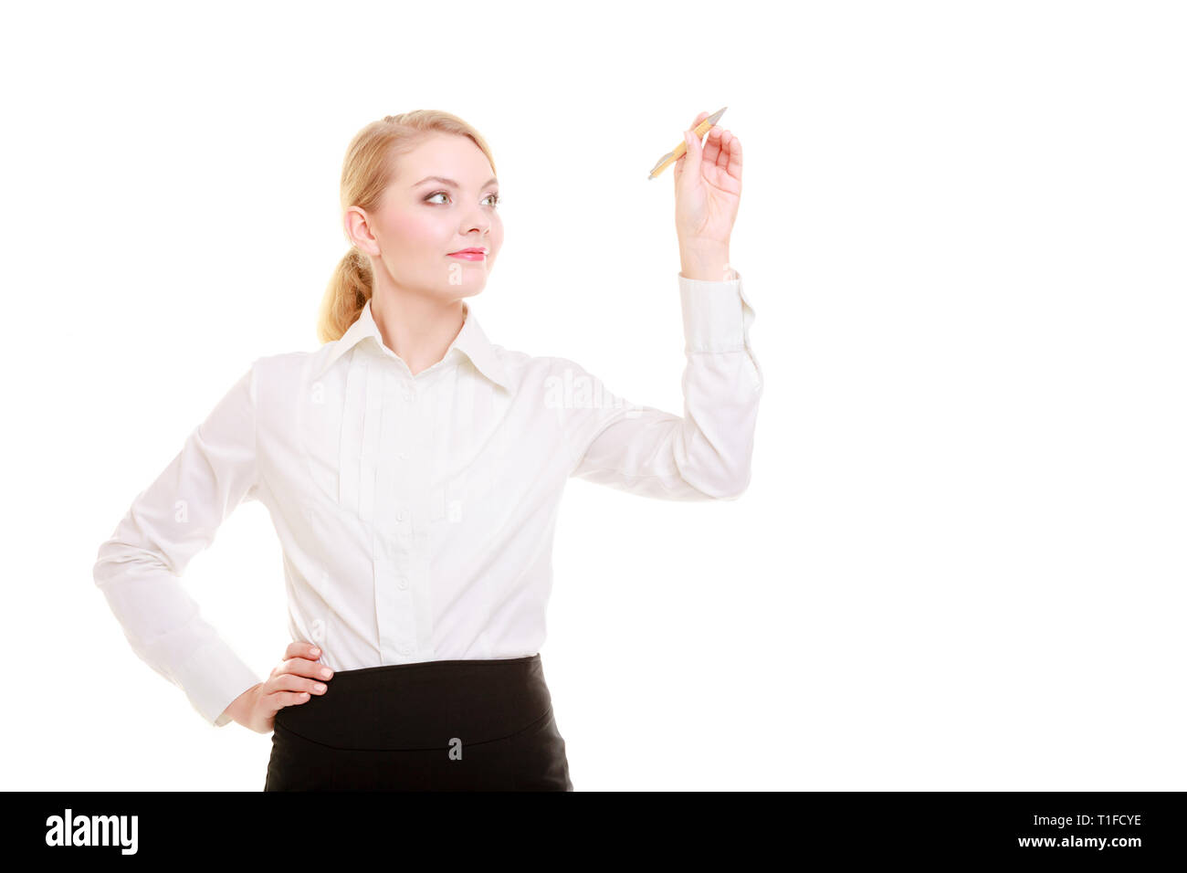 Portrait of businesswoman with pen. Woman writing on empty blank copy