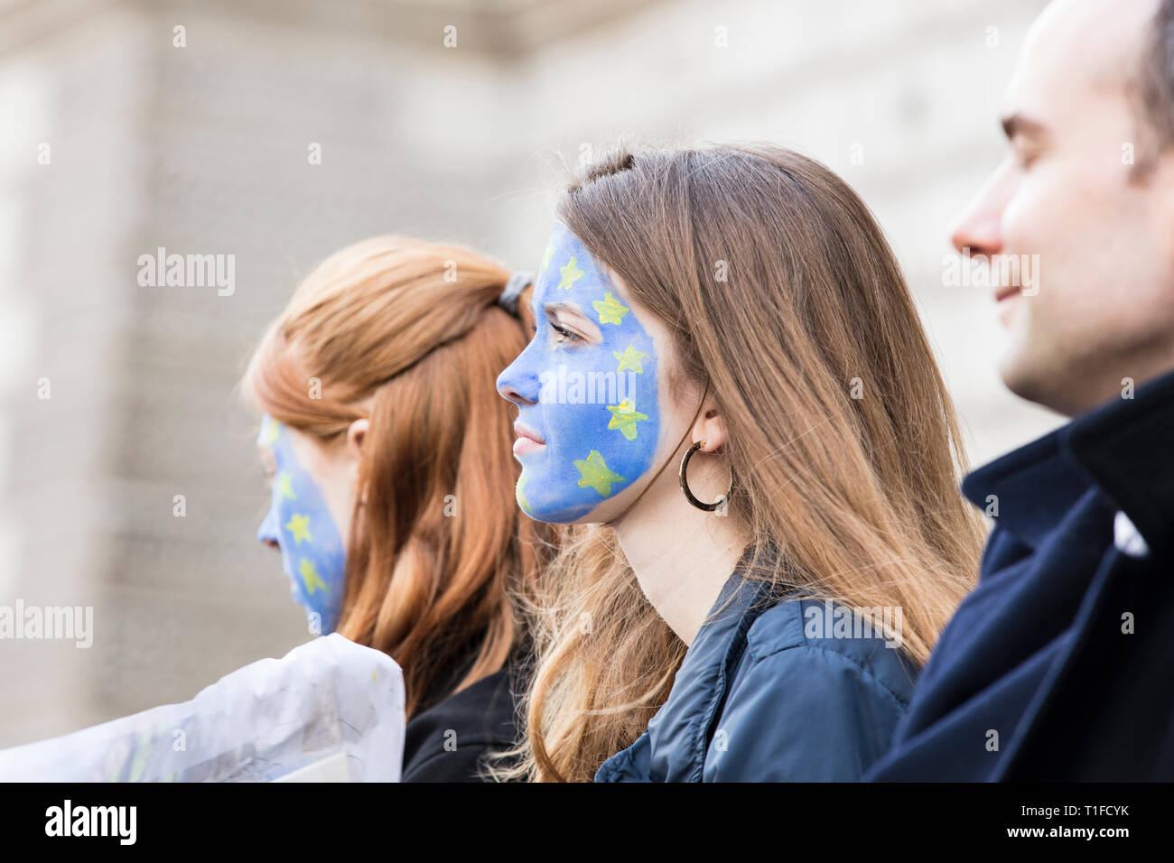 LONDON, UK - March 23rd 2019: People with European Union flag face paint at an anti Brexit march Stock Photo