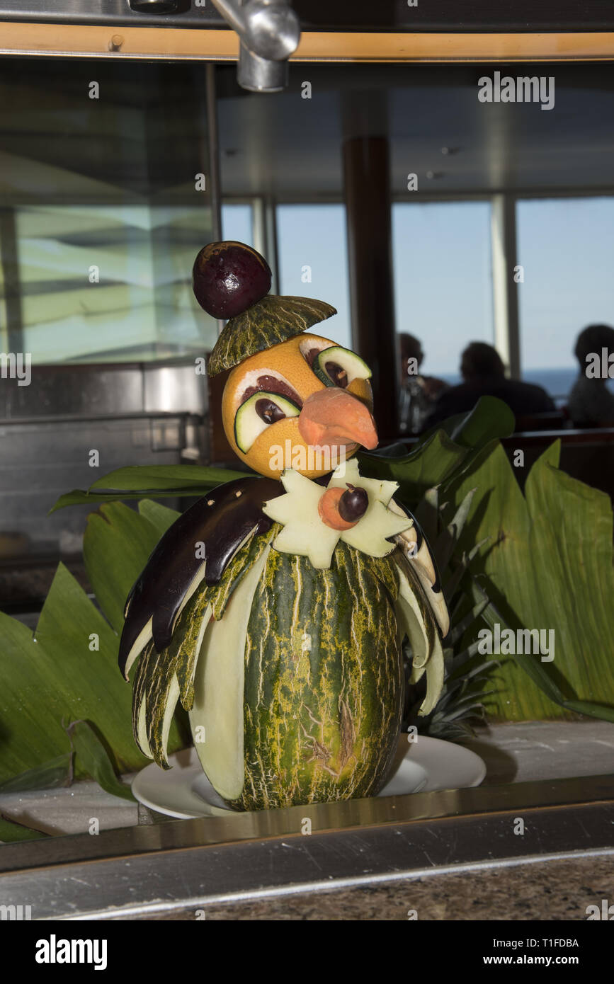 Some stewards aboard cruise ship Mein Schiff 1 are carving pumpkins. Stock Photo