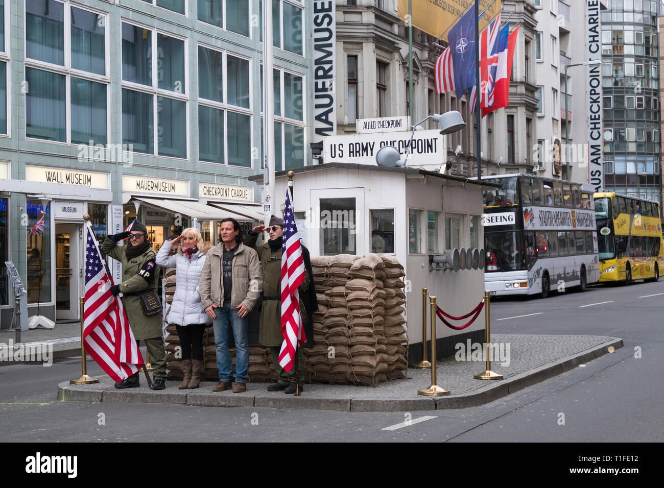 Tourists at Checkpoint Charlie in Berlin Germany Stock Photo