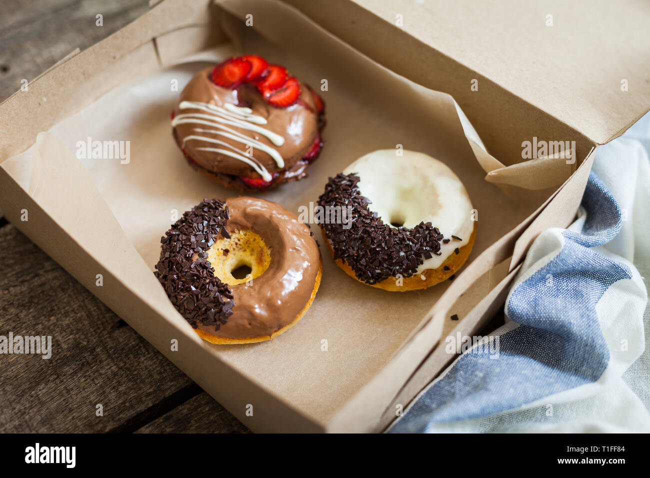 Colorful donuts in box Stock Photo - Alamy