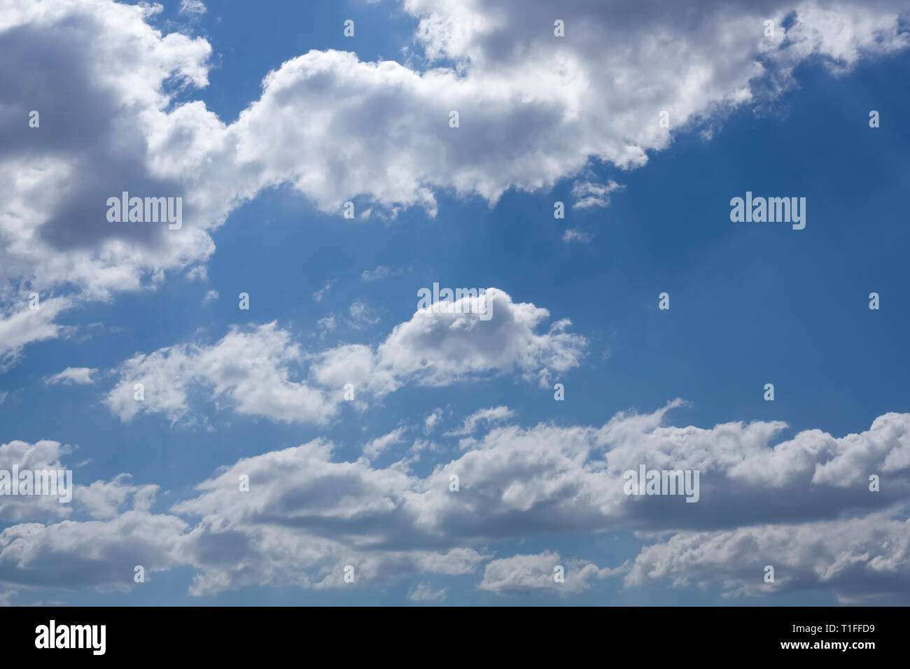 White clouds with a beautiful blue sky in the background Stock Photo ...