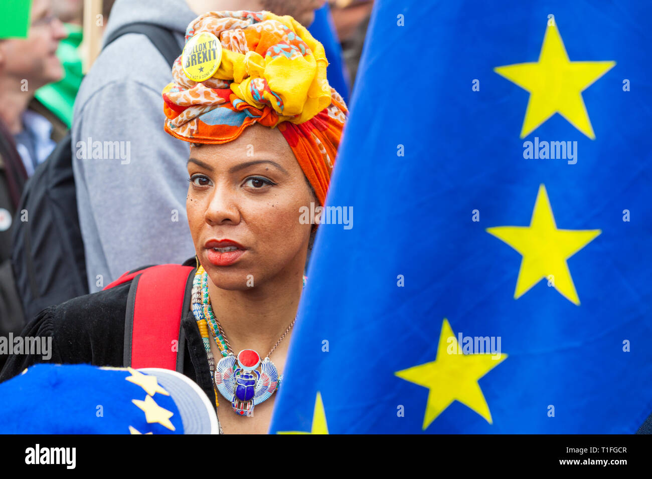 Peoples Vote March. Hundreds of thousands of pro-EU supporters attend a mass march to Westminster. A woman with colourful headscarf and eu flag. Stock Photo