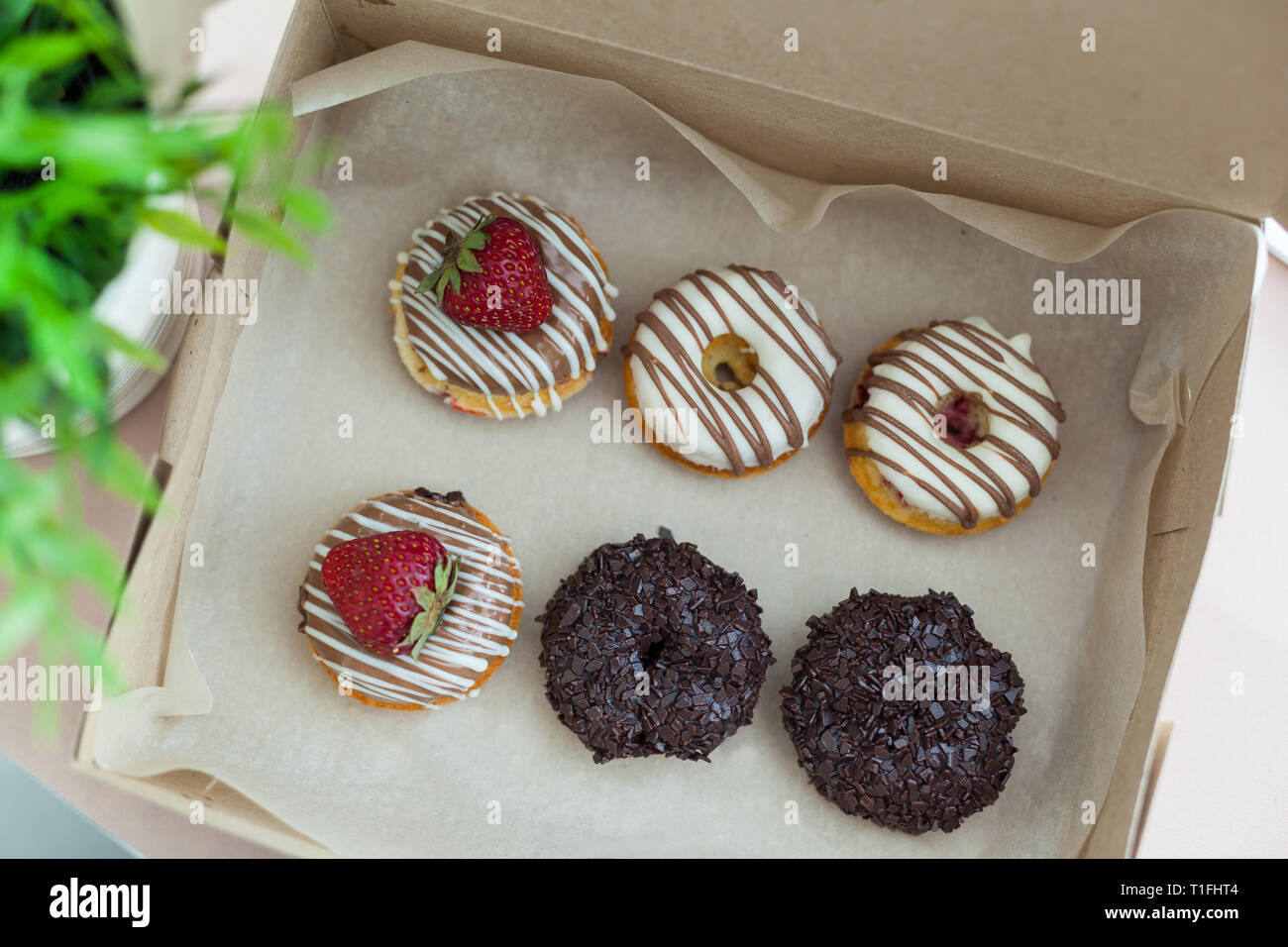 Colorful donuts in box Stock Photo - Alamy