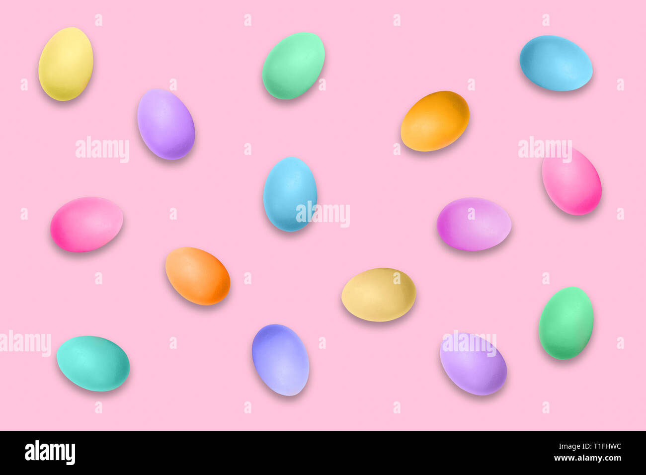 Pastel colored Easter eggs on pink background, Easter pattern Stock Photo