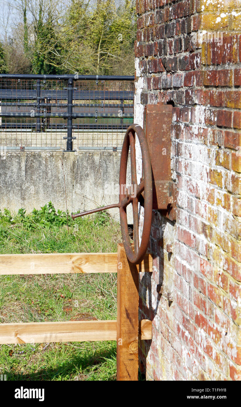 A view of some remaining mechanical features of the former watermill at Horstead, Norfolk, England, United Kingdom, Europe. Stock Photo