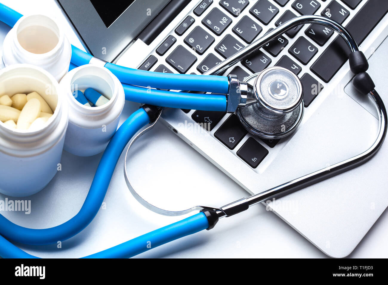 Medical stethoscope on computer keyboard Stock Photo - Alamy