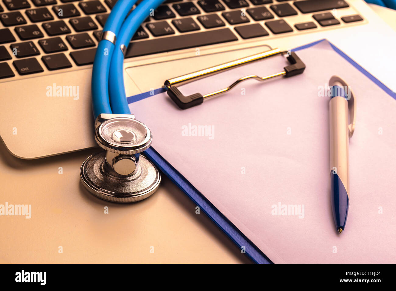 Medical stethoscope on computer keyboard Stock Photo - Alamy