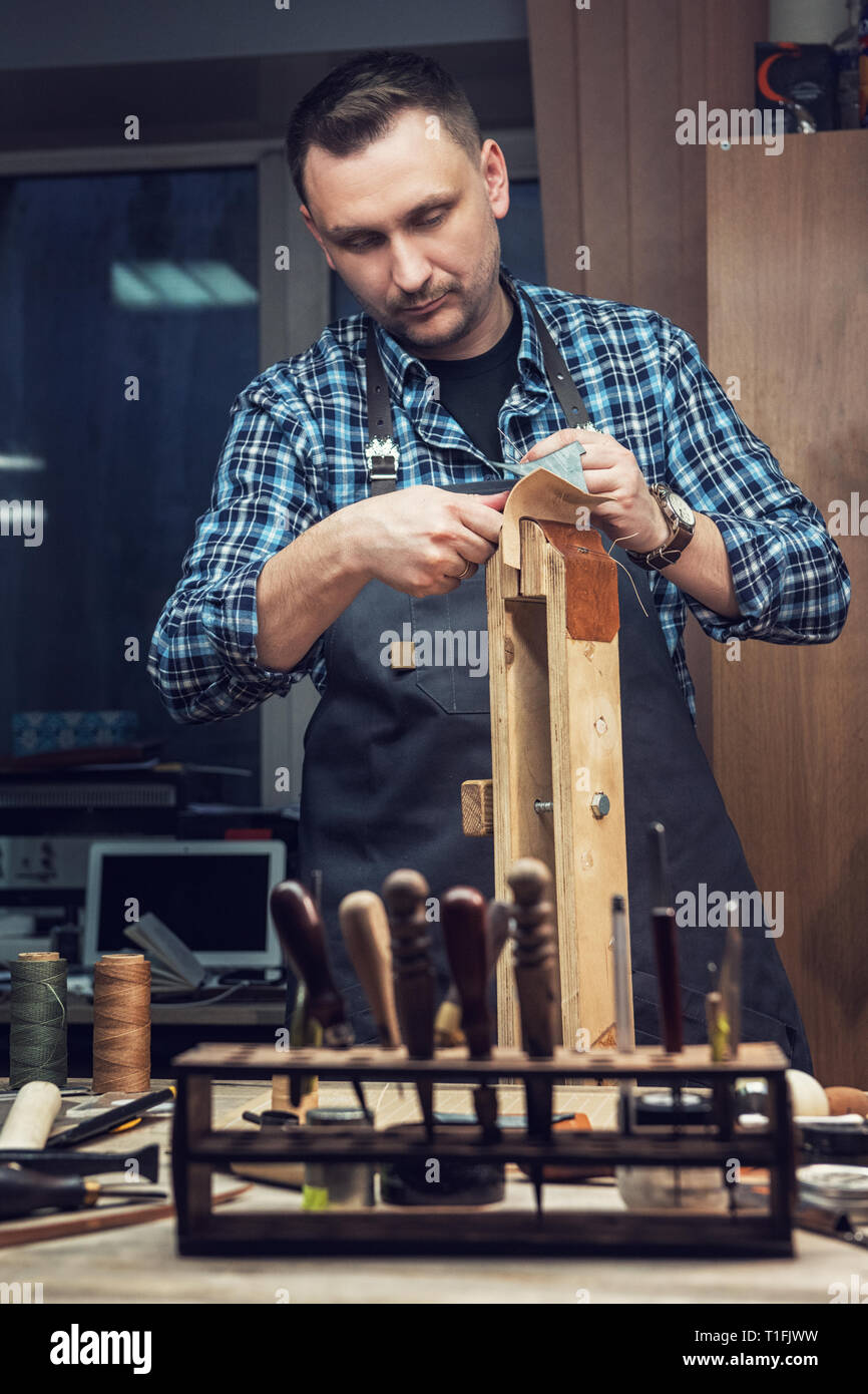 Concept of handmade craft production of leather goods Stock Photo Alamy