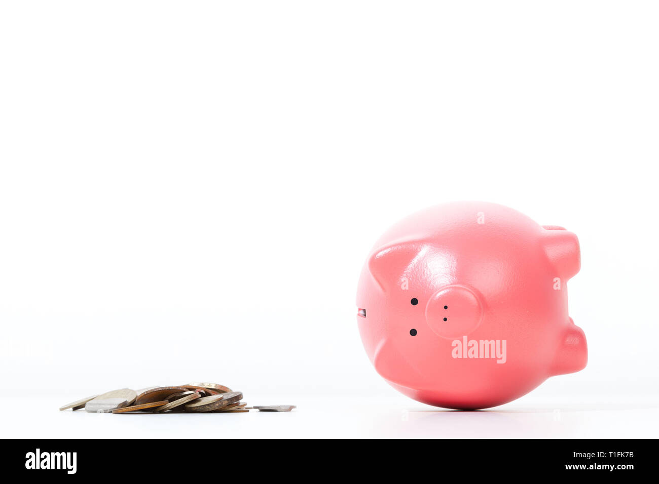 Piggy bank isolated on white background Stock Photo - Alamy