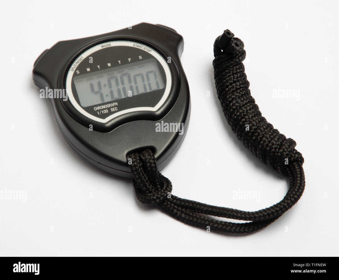 digital stop watch showing exactly 4 minutes.  Black plastic case with an LCD display.  Attached is a cord rolled into a tidy knot. Stock Photo