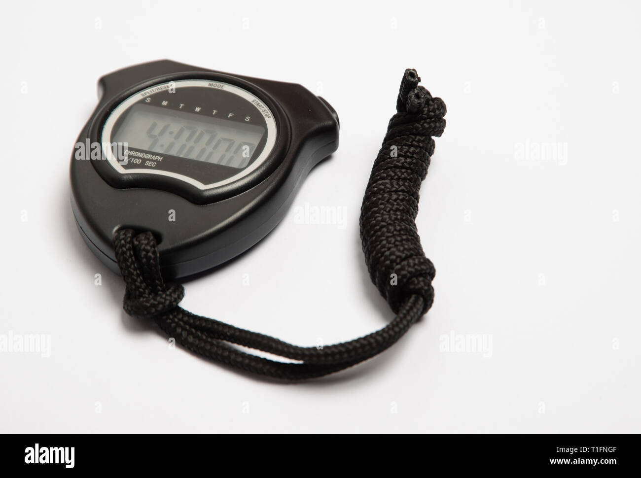 digital stop watch showing exactly 4 minutes. Black plastic case with