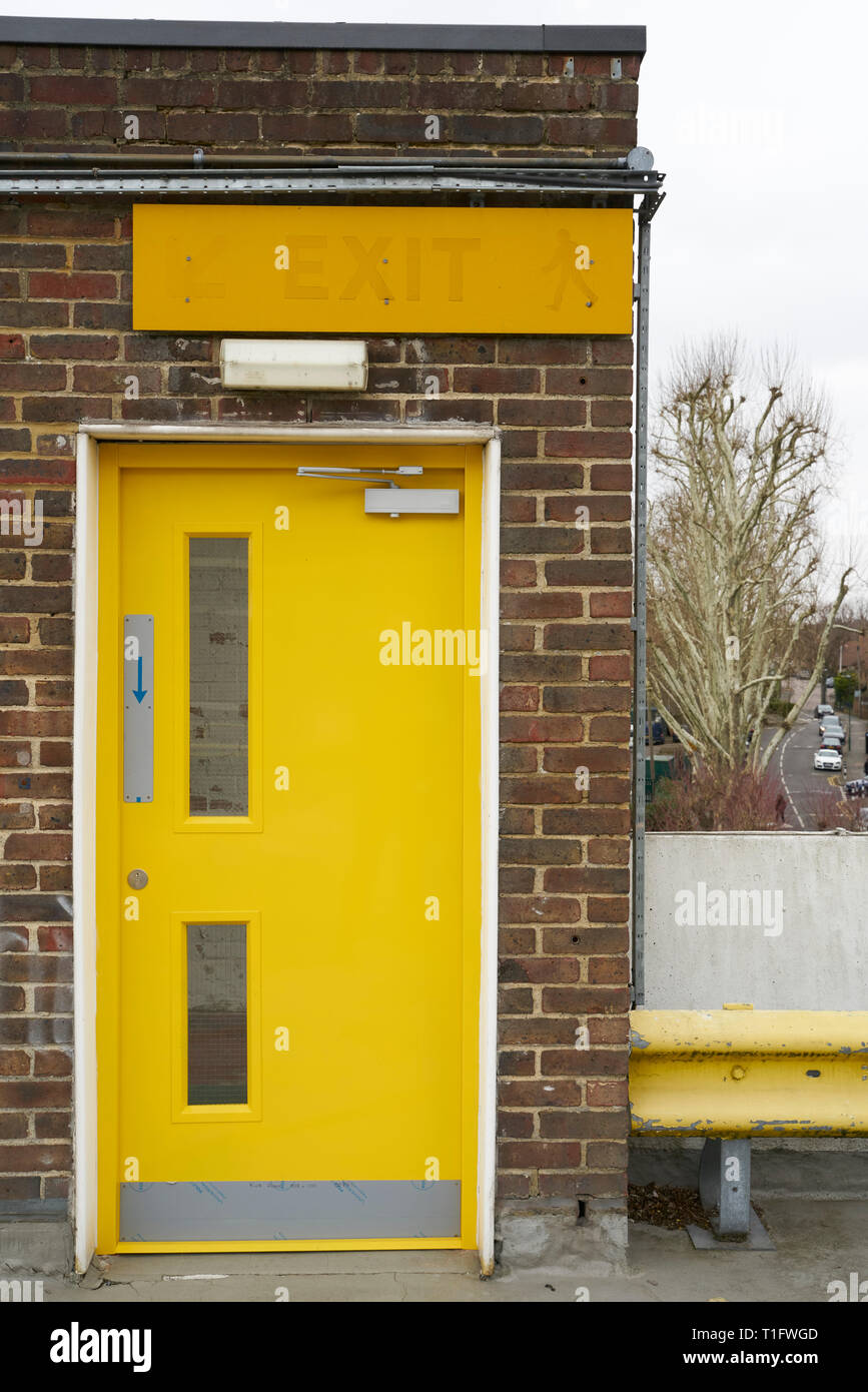 Yellow door and fire exit Stock Photo