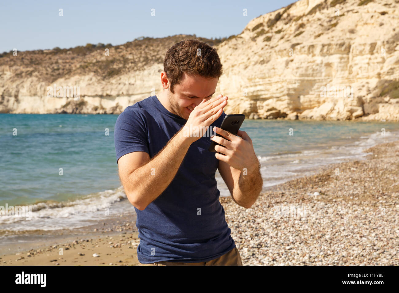 Man in blue t shirt hi-res stock photography and images - Alamy