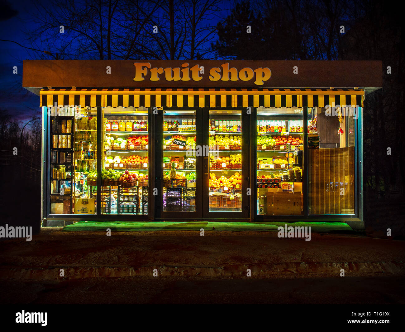 Vegetarian fruit shop at night Stock Photo Alamy