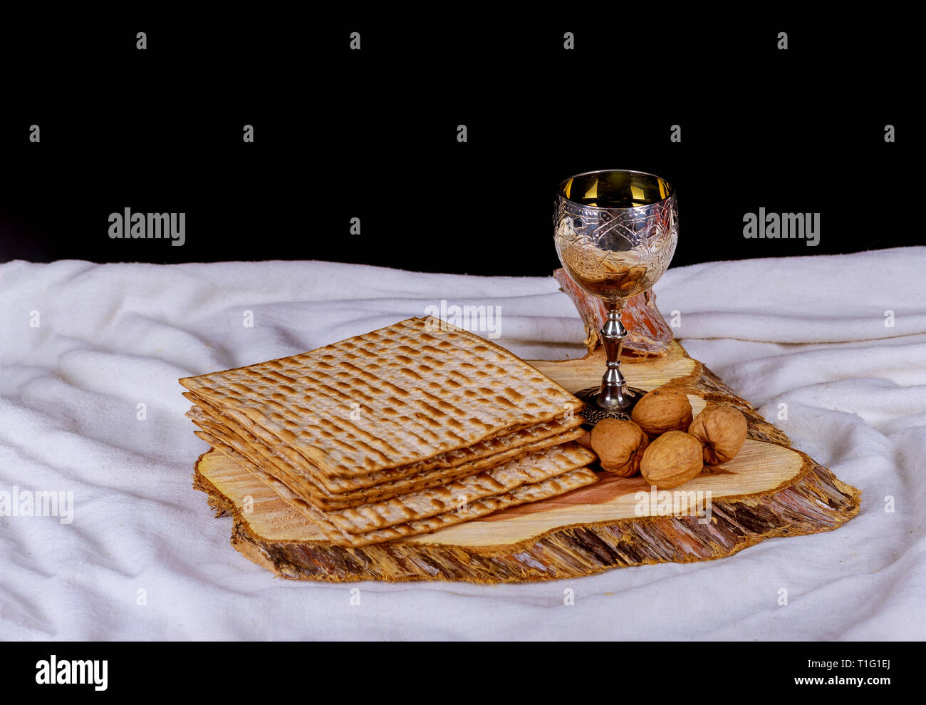Jewish Matzah on Decorated Silver wine cup with matzah, Jewish symbols