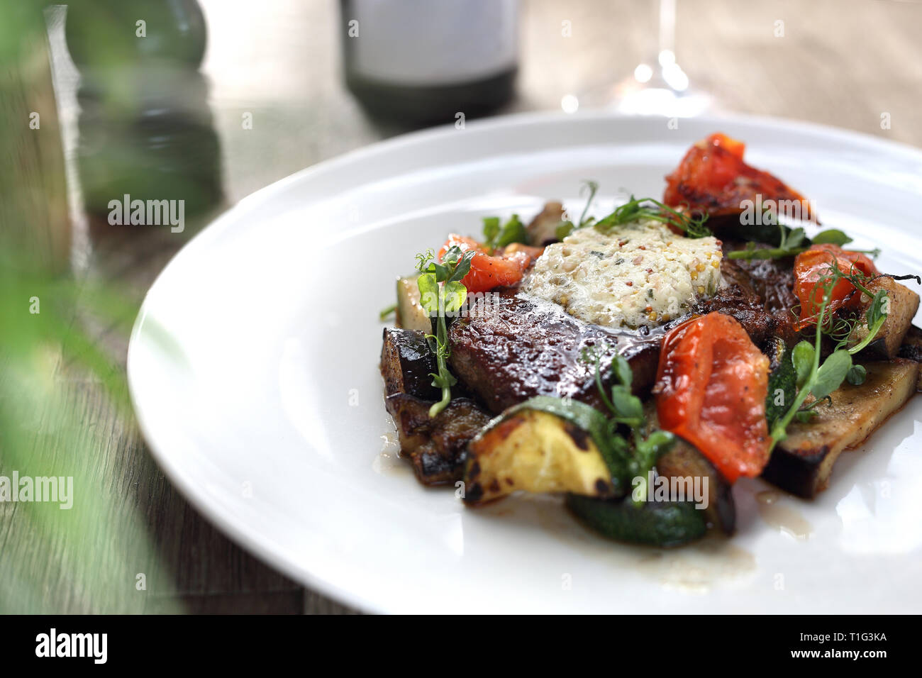 Exquisite Elegant Dinner Beef Steak With Herb Butter And Grilled Vegetables Stock Photo Alamy