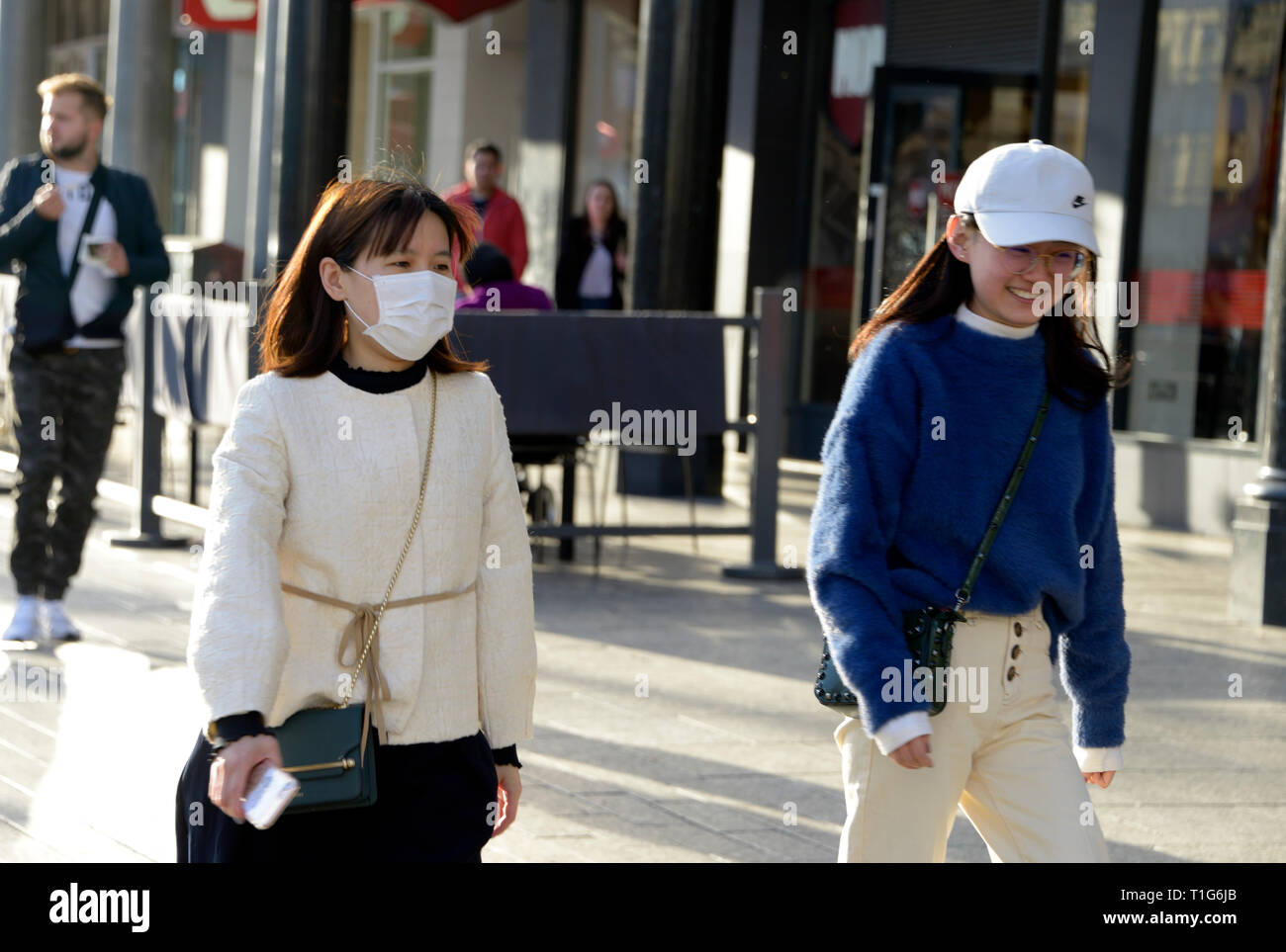 Oriental woman with particulate mask, Nottingham. Stock Photo