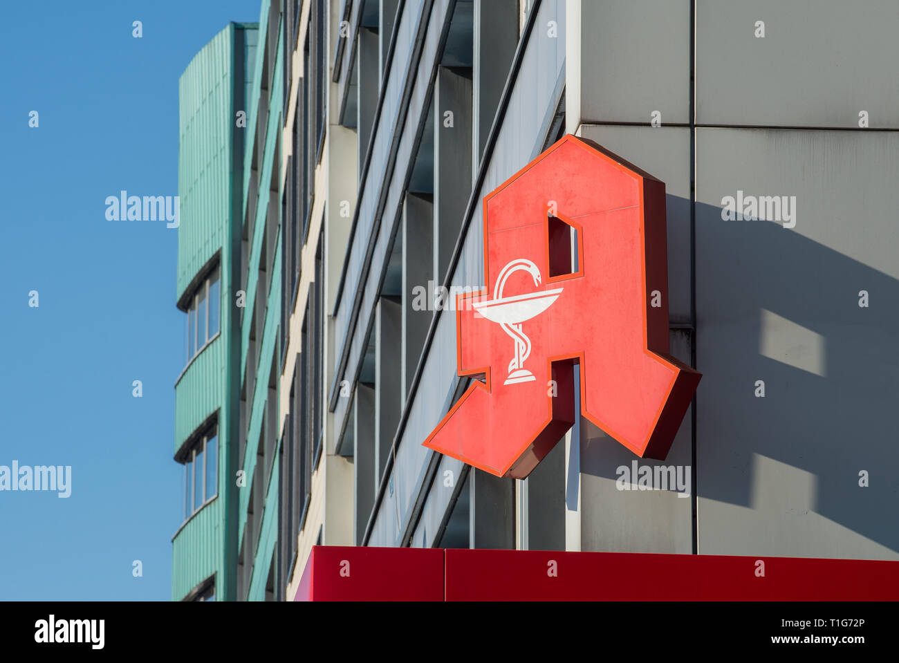 04.02.2018, Berlin, Berlin, Germany - Pharmacy logo on a corner of a house. 0CE180204D001CAROEX.JPG [MODEL RELEASE: NOT APPLICABLE, PROPERTY RELEASE:  Stock Photo