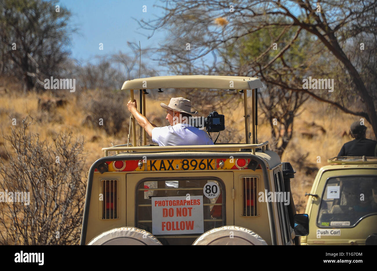 Kenya, Africa - August 2014: Wildlife photographer on location in Samburu  Nature Reserve. Off road vehicles, rear view, bush background Stock Photo -  Alamy