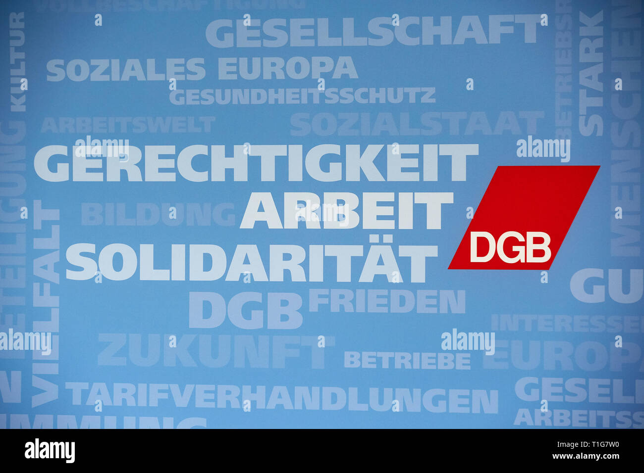 05.03.2019, Berlin, Berlin, Germany - DGB logo wall with words and concepts from politics and business that describe what the association stands for.  Stock Photo