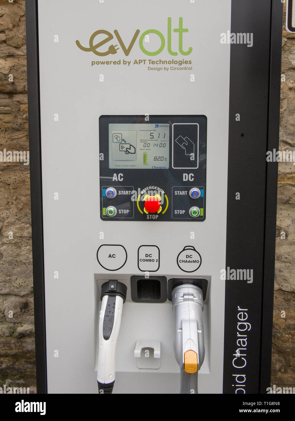 Electric taxi charging up hires stock photography and images Alamy